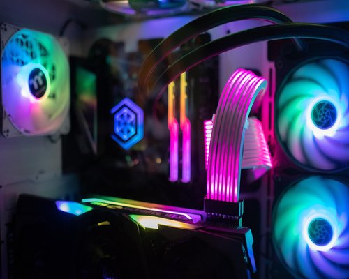 High performance gaming PC setup with neon lighting on display