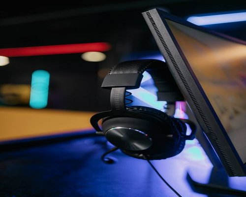 Premium gaming headset and audio equipment on a stand